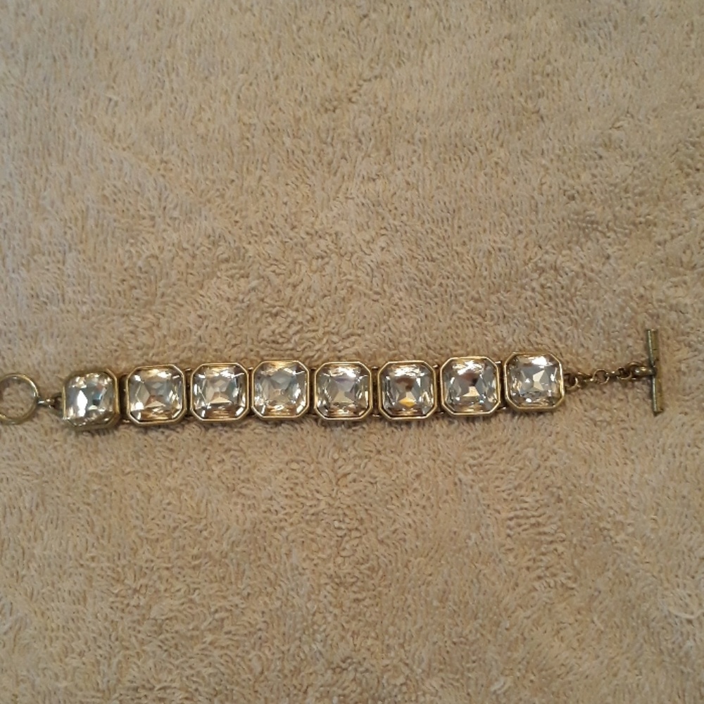 Square cut crystal brass plated bracelet.